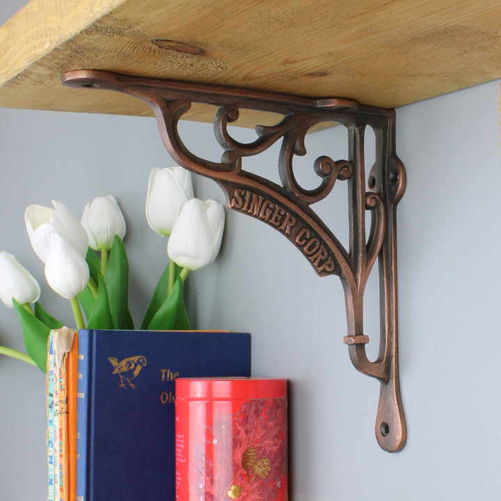 Pair of Antique Cast Iron SINGER Shelf Brackets in a Copper Finish - 200mm x 200mm