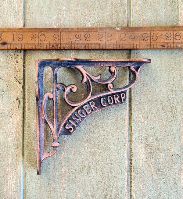 Pair of Cast Iron Singer Corp Shelf Brackets in an Antique Copper Finish - 125mm x 125mm